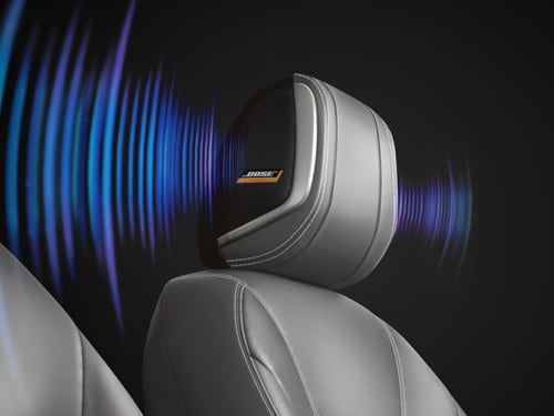 2024 Nissan Kicks front seat showing bose speakers in headrest